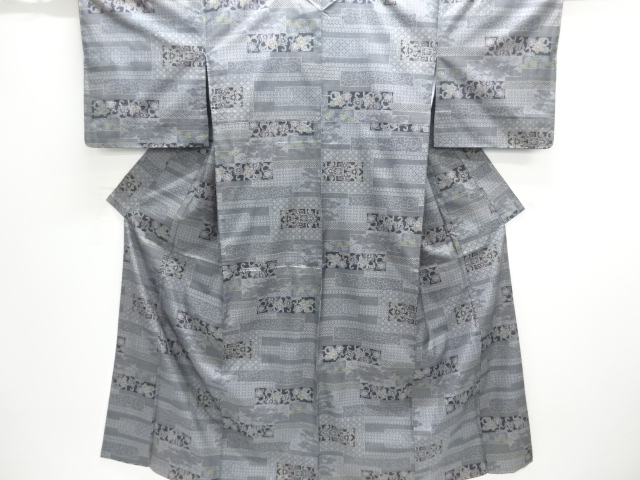 未使用品　横段に花唐草模様織出し本場泥大島紬着物（5マルキ）